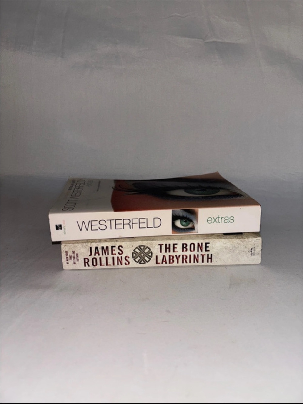 Extras Paperback Book - White Cover